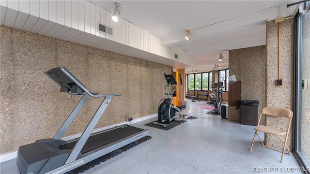 exercise room featuring visible vents