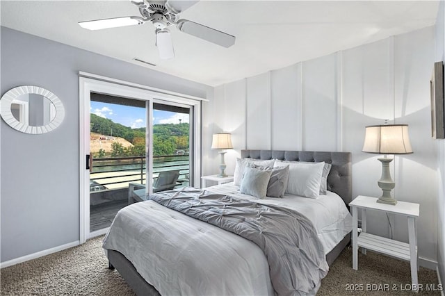 bedroom featuring carpet flooring, visible vents, a ceiling fan, baseboards, and access to outside