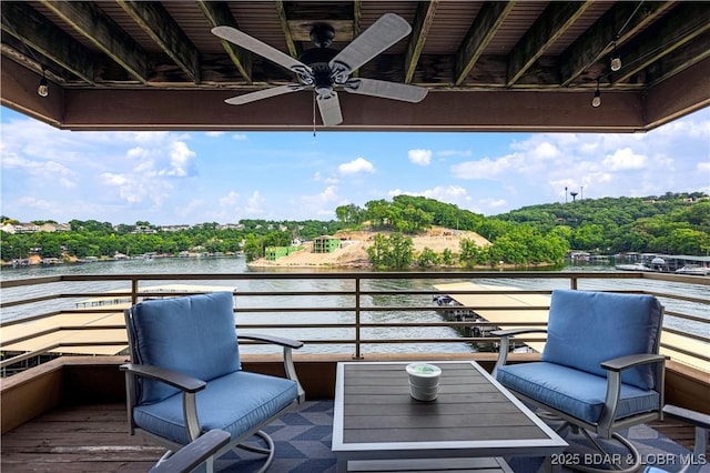 balcony featuring a water view