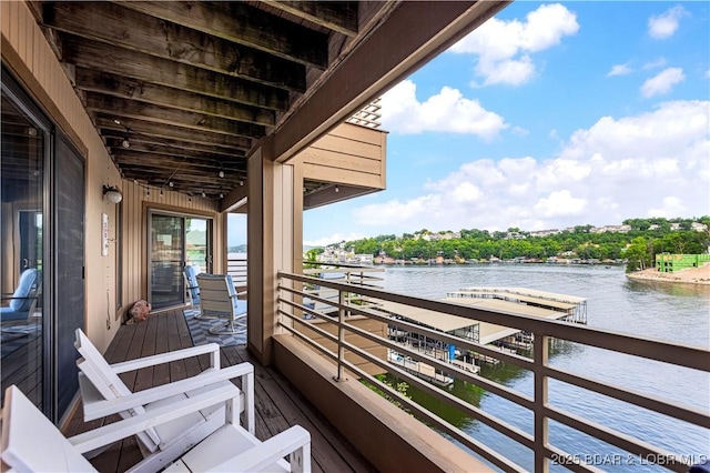 balcony featuring a water view