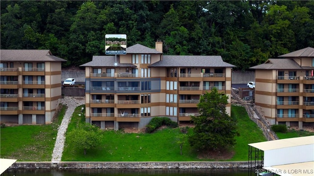 view of property with a water view