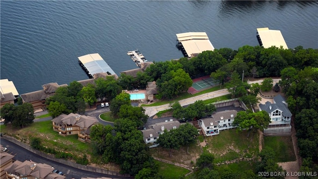 birds eye view of property featuring a water view