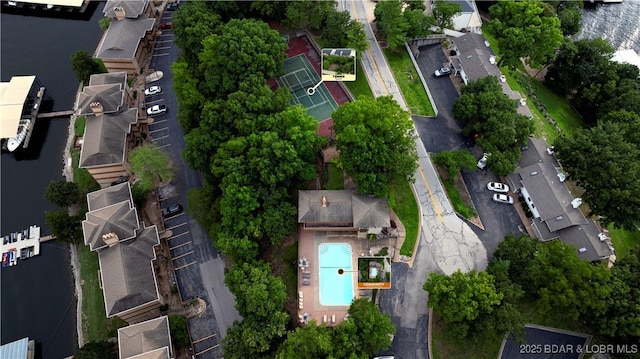 bird's eye view featuring a residential view and a water view