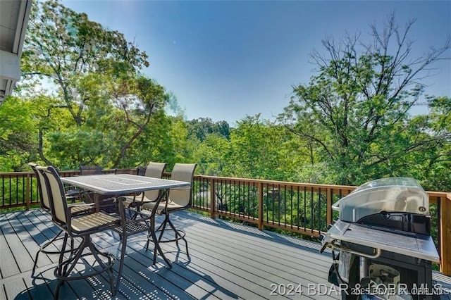 deck featuring outdoor dining space