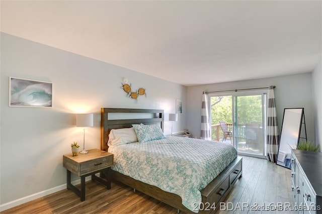 bedroom with access to outside, baseboards, and wood finished floors