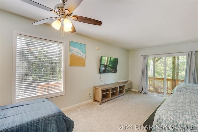 bedroom featuring carpet floors, access to exterior, baseboards, and a ceiling fan