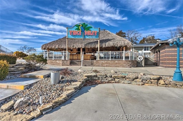 view of front of house with fence