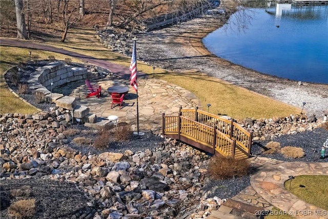 view of home's community featuring a patio area