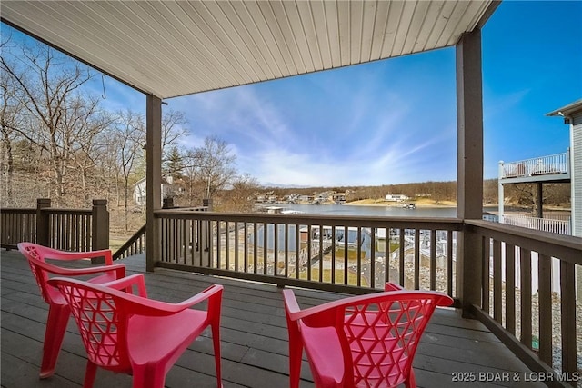 wooden terrace with a water view