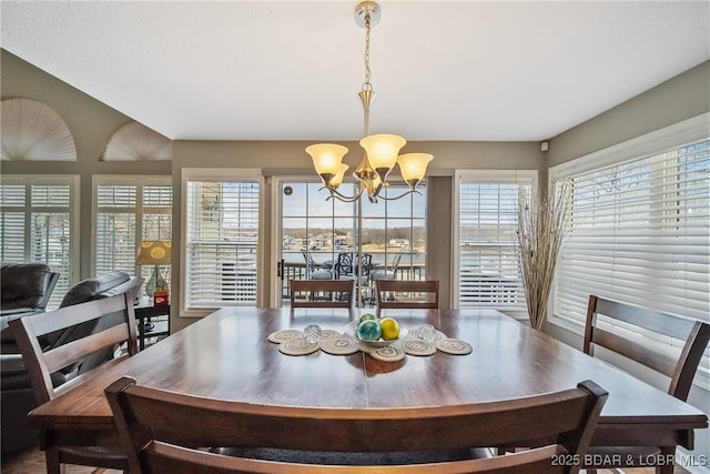 dining area with a notable chandelier