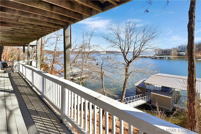 deck featuring a water view