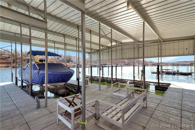 view of dock featuring a water view and boat lift