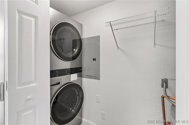 611 Lazy Days Rd Unit V-7, Osage Beach, MO 65065 - laundry room with laundry area, stacked washing maching and dryer, and electric panel