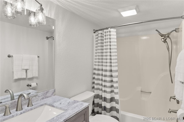 611 Lazy Days Rd Unit V-7, Osage Beach, MO 65065 - full bathroom featuring toilet, a textured wall, vanity, and shower / bath combo with shower curtain