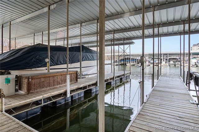 611 Lazy Days Rd Unit V-7, Osage Beach, MO 65065 - view of dock featuring boat lift and a water view