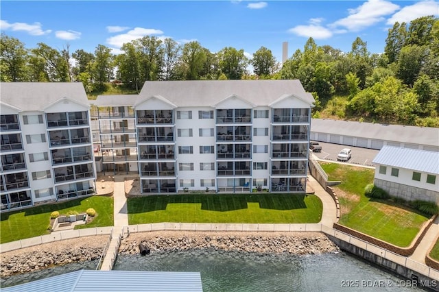 view of property with a water view