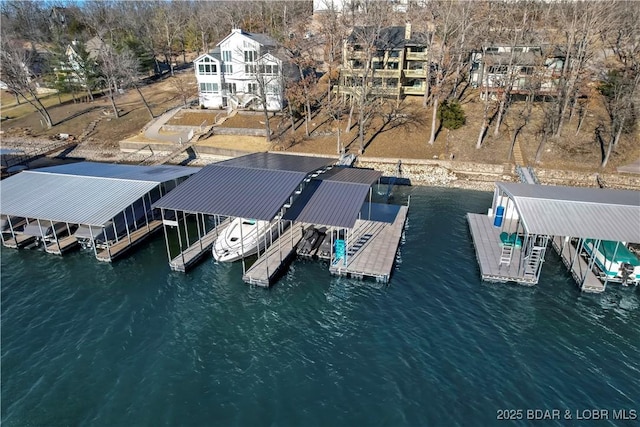 view of dock featuring a water view and boat lift