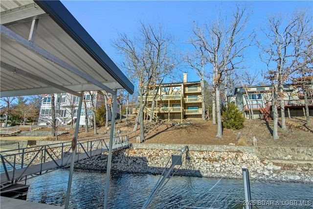 dock area featuring a water view