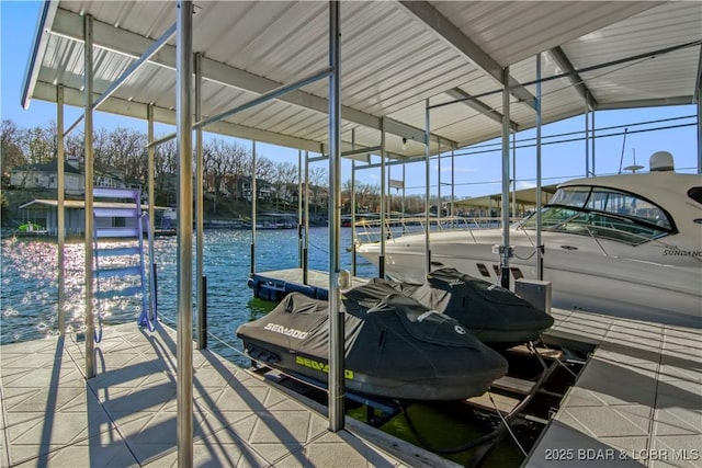 view of dock featuring a water view and boat lift