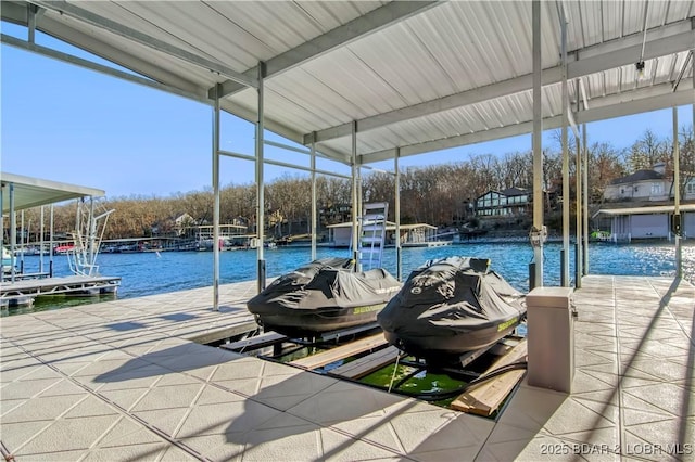 view of pool featuring a dock, a water view, and boat lift