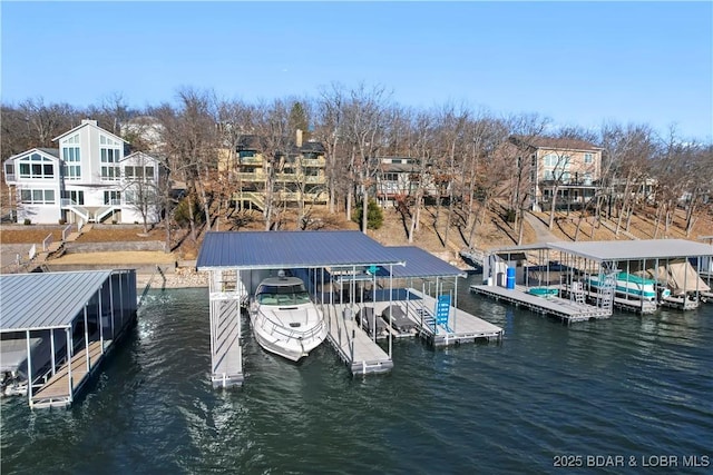 dock area featuring a water view and boat lift