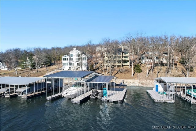 dock area featuring a water view and boat lift