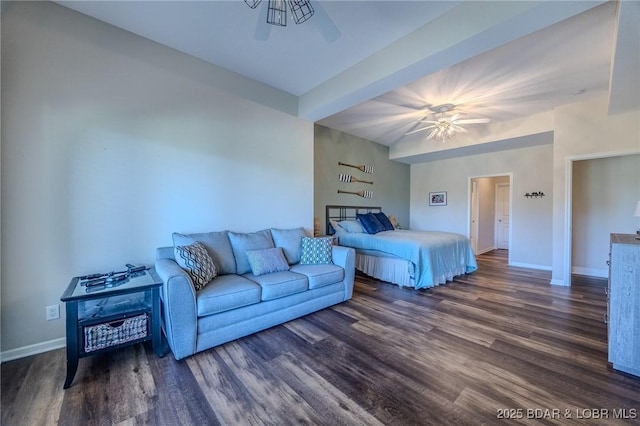 bedroom featuring dark wood-style floors, ceiling fan, and baseboards