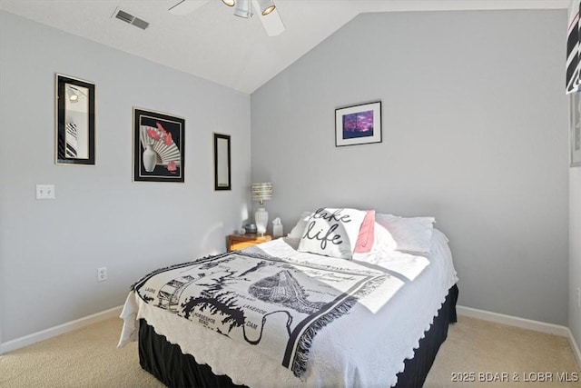 carpeted bedroom featuring visible vents, ceiling fan, vaulted ceiling, and baseboards