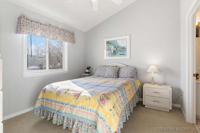 carpeted bedroom with ceiling fan, lofted ceiling, and baseboards