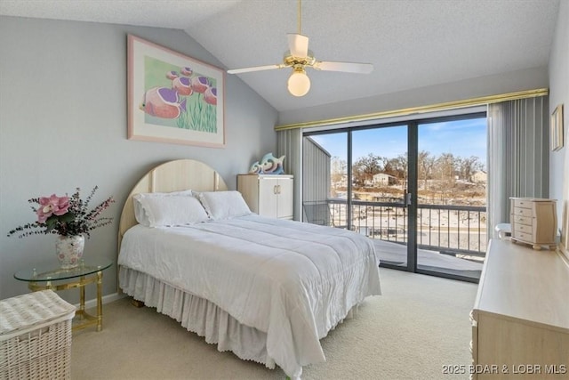 bedroom featuring carpet flooring, a ceiling fan, access to exterior, vaulted ceiling, and baseboards