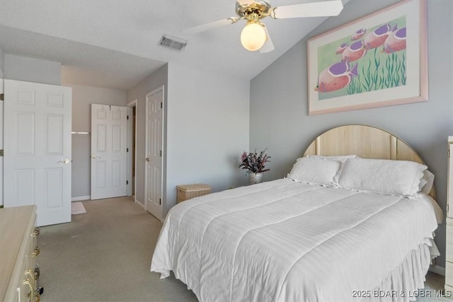 bedroom with visible vents, ceiling fan, baseboards, and carpet floors