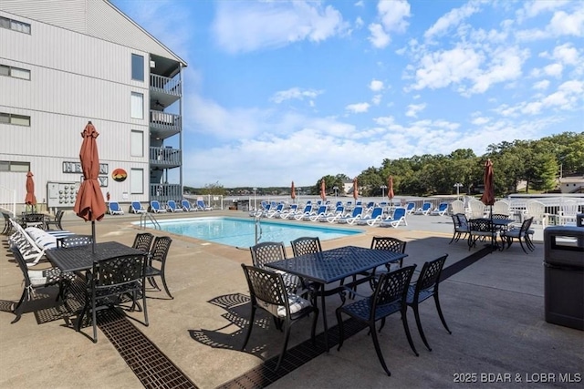 pool with a patio area