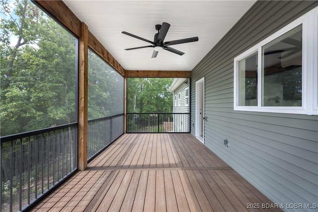 exterior space with a ceiling fan