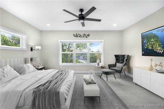 bedroom featuring multiple windows, recessed lighting, carpet flooring, and baseboards