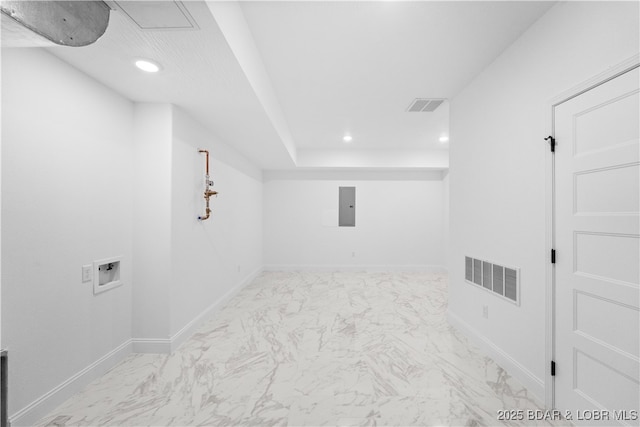 laundry area featuring electric panel, visible vents, marble finish floor, and washer hookup