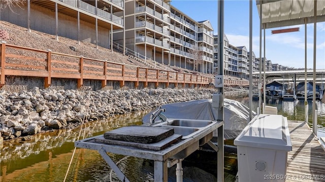 dock area featuring a water view