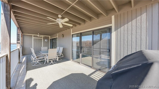 view of patio / terrace with a ceiling fan and outdoor dining area