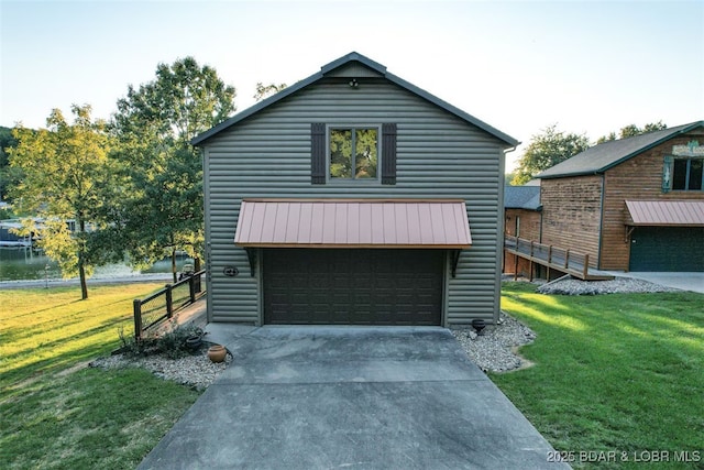 garage featuring driveway