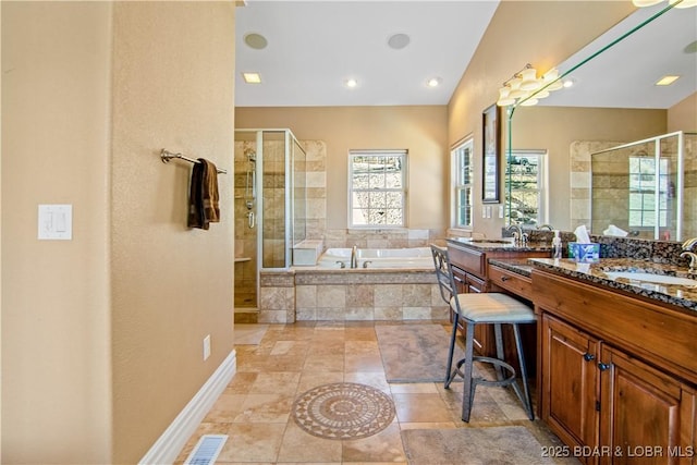 260 Greystone Ln, Villages, MO 65079 - bathroom featuring a garden tub, visible vents, a stall shower, vanity, and tile patterned flooring