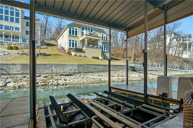 260 Greystone Ln, Villages, MO 65079 - view of dock featuring a lawn, a water view, and boat lift