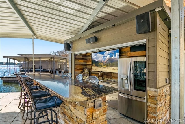 260 Greystone Ln, Villages, MO 65079 - view of patio featuring a dock, a water view, and outdoor dry bar