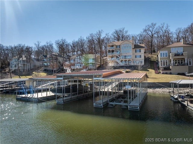 260 Greystone Ln, Villages, MO 65079 - view of dock with a residential view, a water view, and boat lift