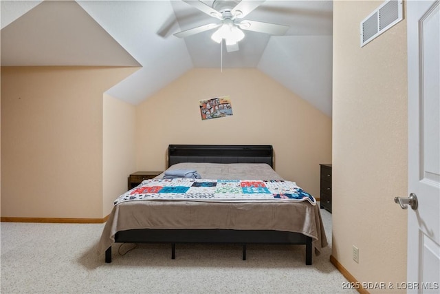 bedroom featuring lofted ceiling, ceiling fan, carpet flooring, visible vents, and baseboards