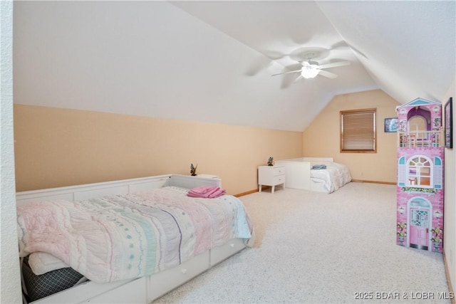 carpeted bedroom featuring lofted ceiling, ceiling fan, and baseboards