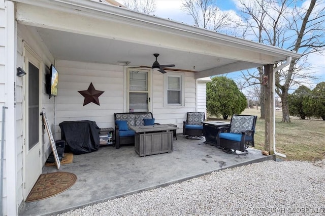 view of patio / terrace featuring ceiling fan