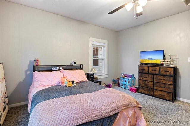 carpeted bedroom featuring ceiling fan and baseboards