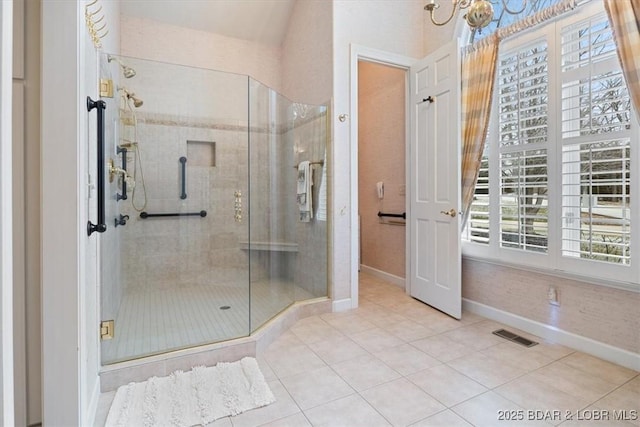 full bath featuring baseboards, a shower stall, visible vents, and tile patterned flooring