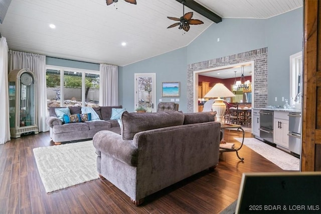 living room featuring high vaulted ceiling, dark wood finished floors, beamed ceiling, and ceiling fan with notable chandelier