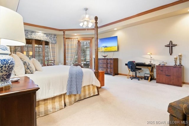 bedroom with carpet flooring, baseboards, access to exterior, a raised ceiling, and crown molding