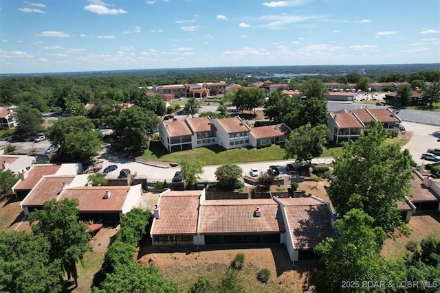 birds eye view of property with a residential view